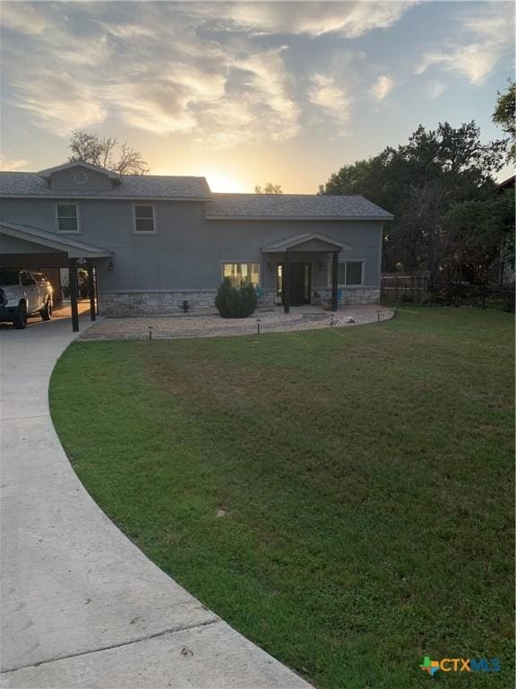 164 Buck Ln, Belton, TX 76513 - back of property featuring concrete driveway and a carport