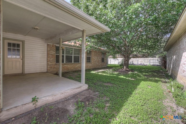 1518 Dustin Cade Dr, New Braunfels, TX 78130 - fenced backyard featuring a patio