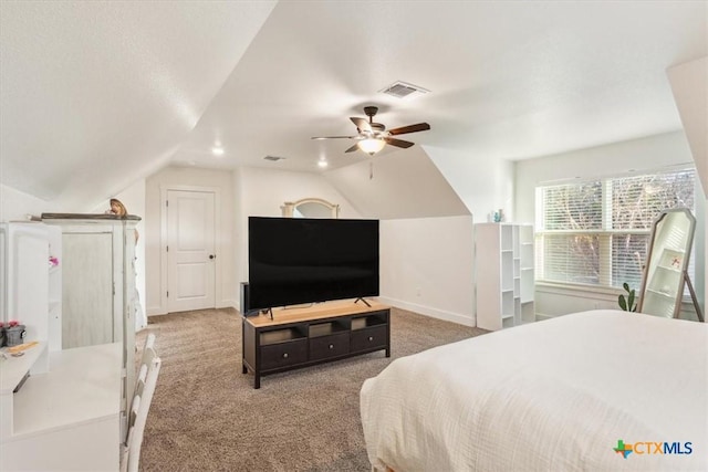 4851 Goliad Dr, Temple, TX 76502 - carpeted bedroom with visible vents, baseboards, ceiling fan, and lofted ceiling