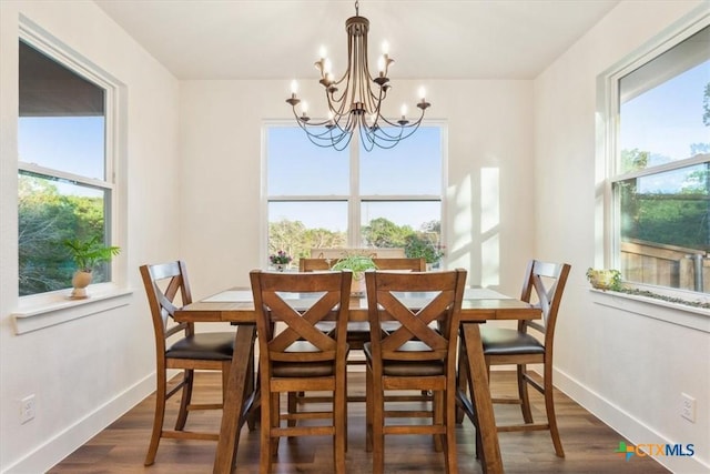4851 Goliad Dr, Temple, TX 76502 - dining room featuring an inviting chandelier, baseboards, and plenty of natural light