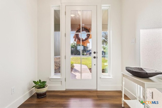 4851 Goliad Dr, Temple, TX 76502 - doorway with wood finished floors, baseboards, and plenty of natural light