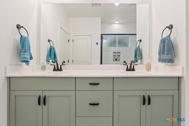 4851 Goliad Dr, Temple, TX 76502 - full bath with double vanity, a sink, and visible vents