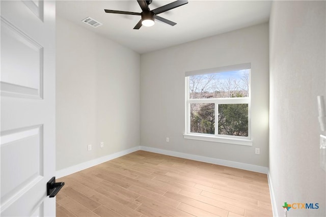 20029 Continental Dr, Lago Vista, TX 78645 - unfurnished room featuring a ceiling fan, light wood-style flooring, and baseboards