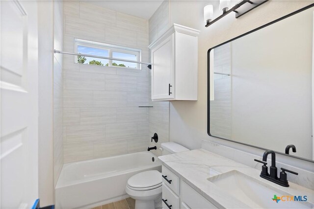 20029 Continental Dr, Lago Vista, TX 78645 - bathroom with vanity, toilet, and washtub / shower combination