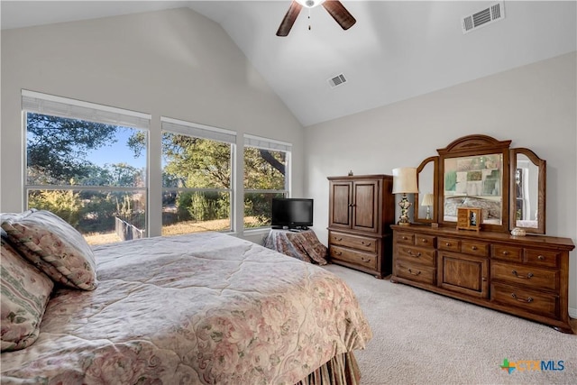 bedroom featuring ceiling fan, high vaulted ceiling, and light colored carpet