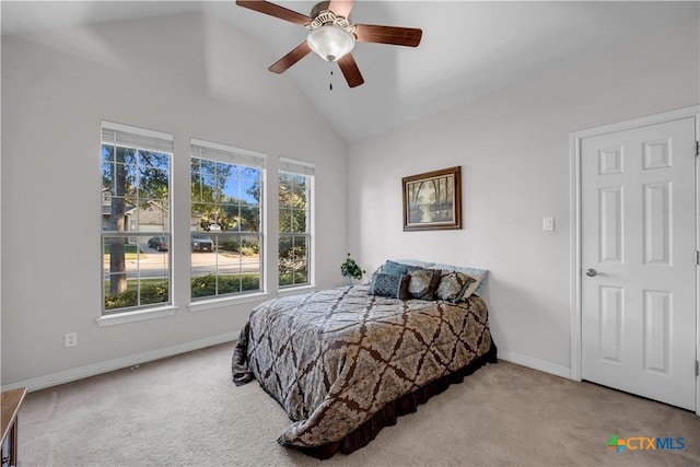 bedroom featuring ceiling fan, carpet floors, and high vaulted ceiling