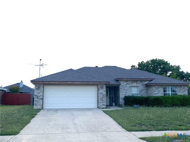 4803 Addie Dr, Killeen, TX 76542 - ranch-style house featuring an attached garage and concrete driveway