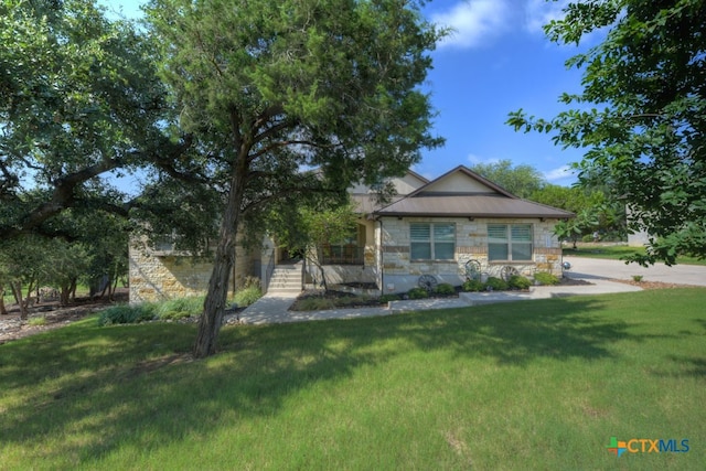 view of front of home with a front yard