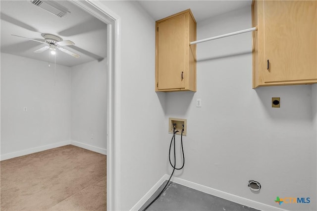 laundry area featuring cabinet space, washer hookup, ceiling fan, and baseboards