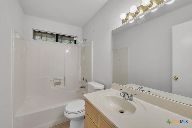 bathroom with toilet, bathtub / shower combination, and vanity