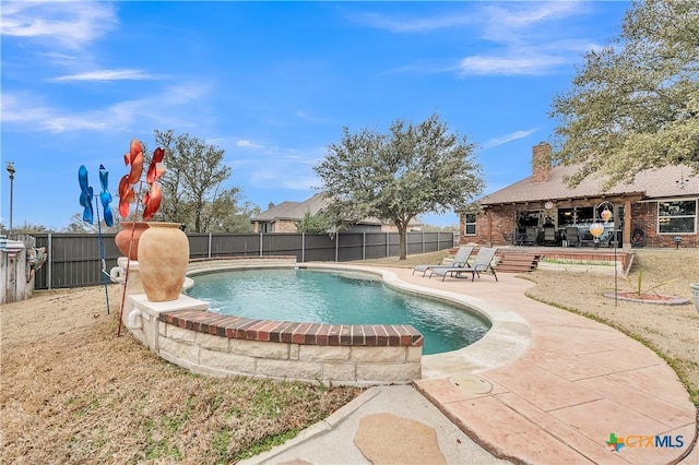 view of pool with a fenced in pool, a patio area, and a fenced backyard