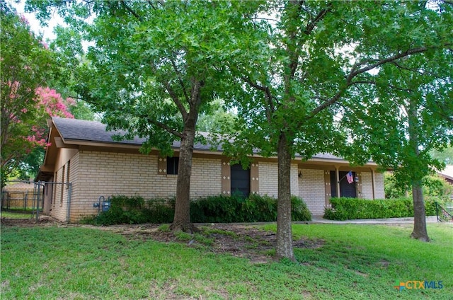 303 E 20th Ave, Belton, TX 76513 - ranch-style home with brick siding