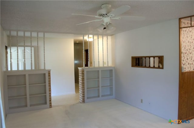 303 E 20th Ave, Belton, TX 76513 - carpeted empty room with a ceiling fan and a textured ceiling