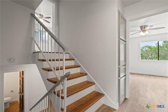 910 Cliffside Dr, Harker Heights, TX 76548 - staircase with ceiling fan, wood finished floors, and baseboards