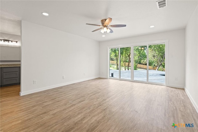 910 Cliffside Dr, Harker Heights, TX 76548 - spare room with a ceiling fan, light wood-style floors, baseboards, and recessed lighting