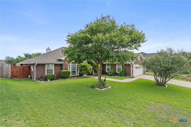 5608 Drystone Ln, Killeen, TX 76542 - obstructed view of property with driveway, brick siding, and a garage