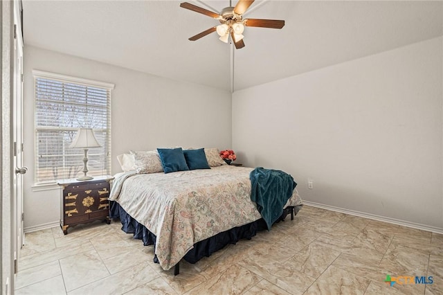 bedroom with ceiling fan and vaulted ceiling