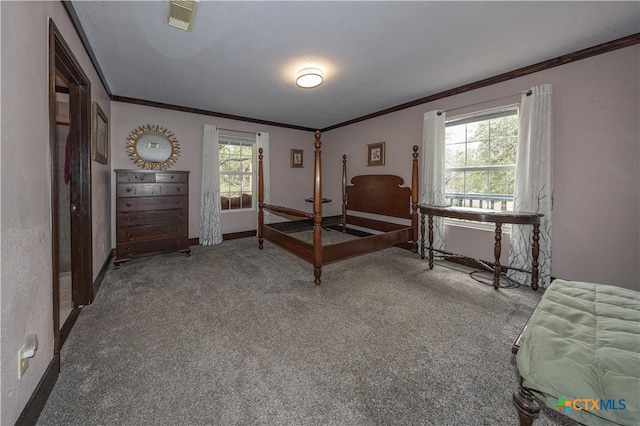 bedroom with carpet flooring and crown molding