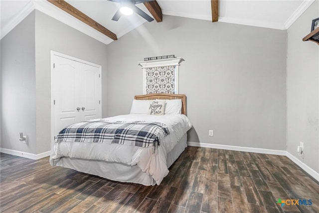 bedroom featuring lofted ceiling with beams, baseboards, and wood finished floors