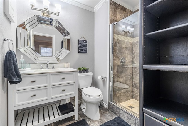 full bath featuring toilet, a notable chandelier, vanity, ornamental molding, and a shower stall