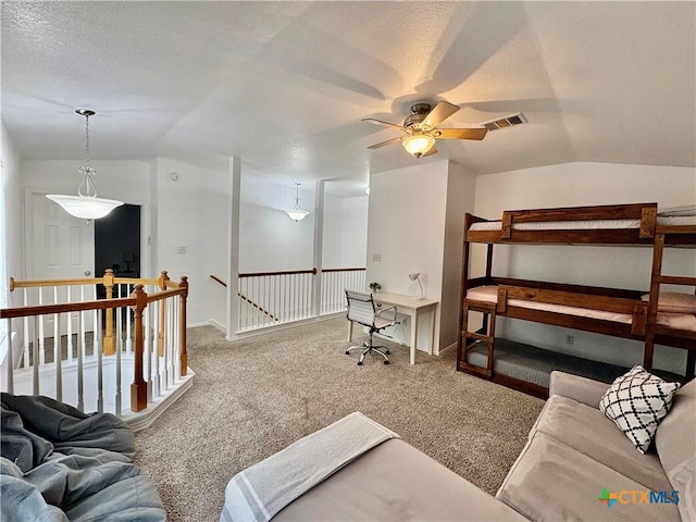 5902 Chuckwagon Cir, Killeen, TX 76542 - living area with vaulted ceiling, carpet floors, a ceiling fan, and a textured ceiling