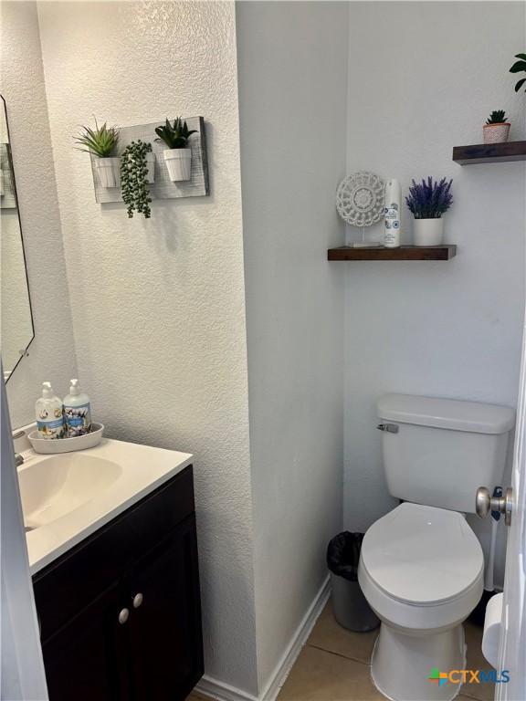 5902 Chuckwagon Cir, Killeen, TX 76542 - bathroom featuring vanity, tile patterned floors, and toilet