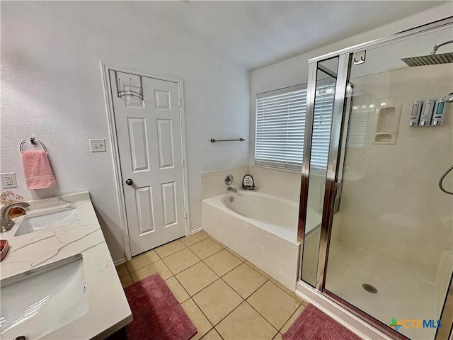 5902 Chuckwagon Cir, Killeen, TX 76542 - bathroom with a stall shower, tile patterned flooring, a bath, and double vanity