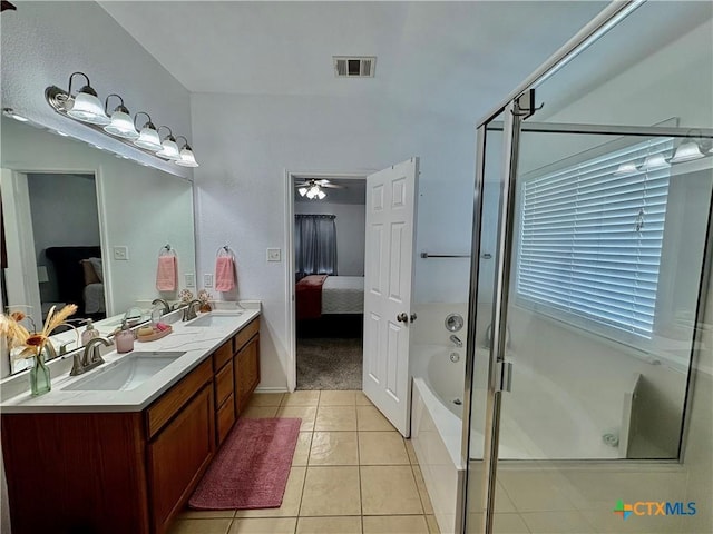 5902 Chuckwagon Cir, Killeen, TX 76542 - bathroom featuring ensuite bathroom, a bathtub, double vanity, tile patterned floors, and a shower with door
