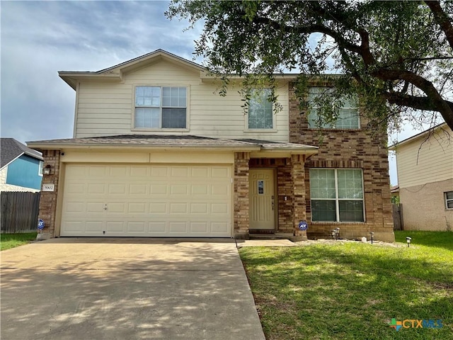5902 Chuckwagon Cir, Killeen, TX 76542 - traditional-style house featuring driveway, a garage, and brick siding