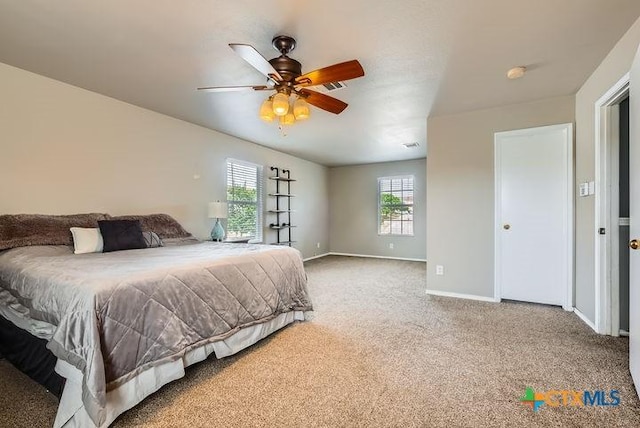 25923 Torch Lily, San Antonio, TX 78260 - carpeted bedroom with baseboards and a ceiling fan