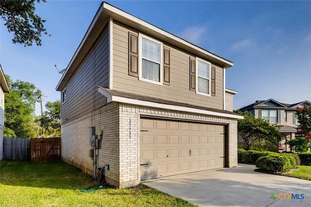 25923 Torch Lily, San Antonio, TX 78260 - view of home's exterior with brick siding, an attached garage, and driveway