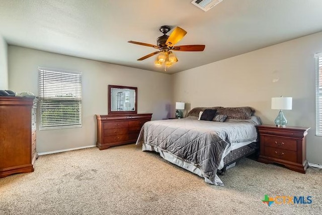 25923 Torch Lily, San Antonio, TX 78260 - carpeted bedroom with multiple windows, baseboards, and a ceiling fan