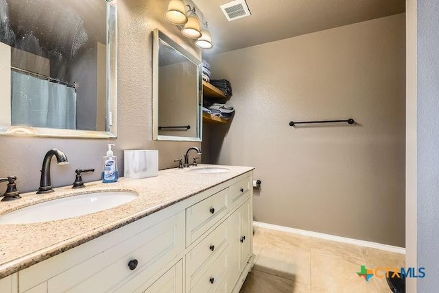 25923 Torch Lily, San Antonio, TX 78260 - bathroom featuring tile patterned flooring, double vanity, curtained shower, and baseboards
