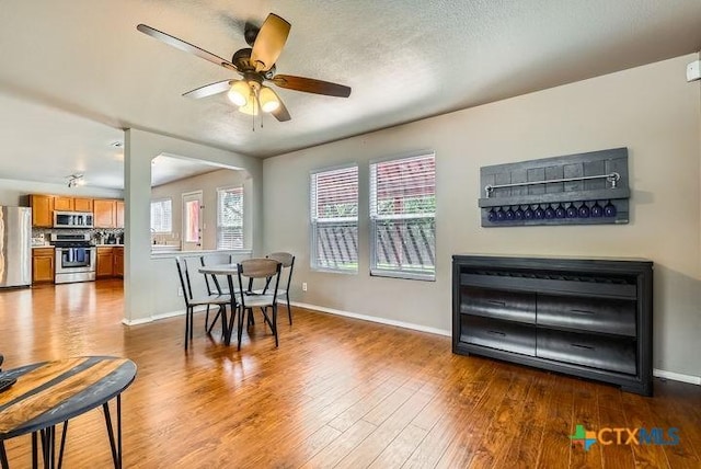 25923 Torch Lily, San Antonio, TX 78260 - dining area with baseboards, wood finished floors, and a ceiling fan
