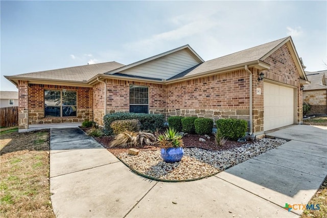 ranch-style home with a garage