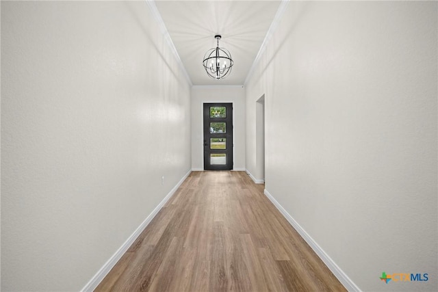 15938 Salado Dr, Temple, TX 76502 - doorway to outside featuring wood finished floors, a chandelier, and crown molding