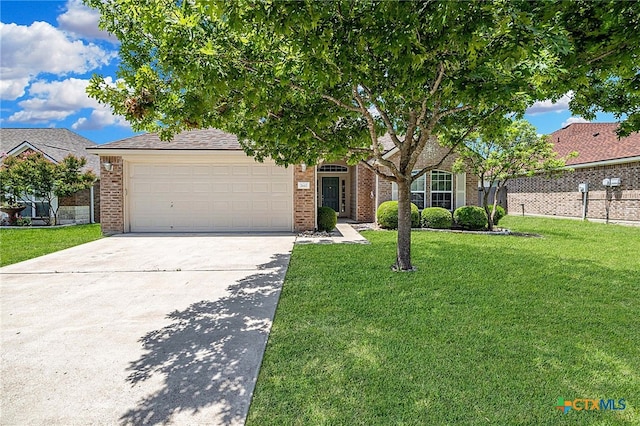 7617 Amber Meadow Loop, Temple, TX 76502 - obstructed view of property featuring a garage, driveway, and brick siding