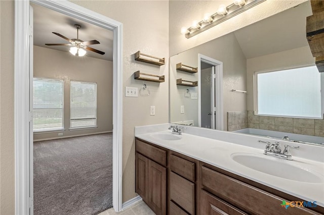 7617 Amber Meadow Loop, Temple, TX 76502 - bathroom with healthy amount of natural light, ceiling fan, double vanity, and a garden tub