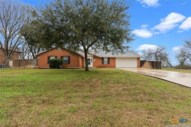 300 Ridge Crest Dr, Seguin, TX 78155 - ranch-style house with concrete driveway, a garage, brick siding, and central air condition unit