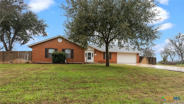 300 Ridge Crest Dr, Seguin, TX 78155 - ranch-style house featuring driveway, brick siding, and a garage