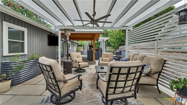 view of patio with ceiling fan