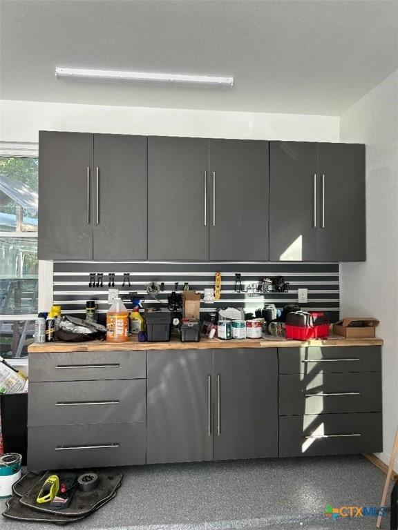 kitchen featuring gray cabinetry and modern cabinets