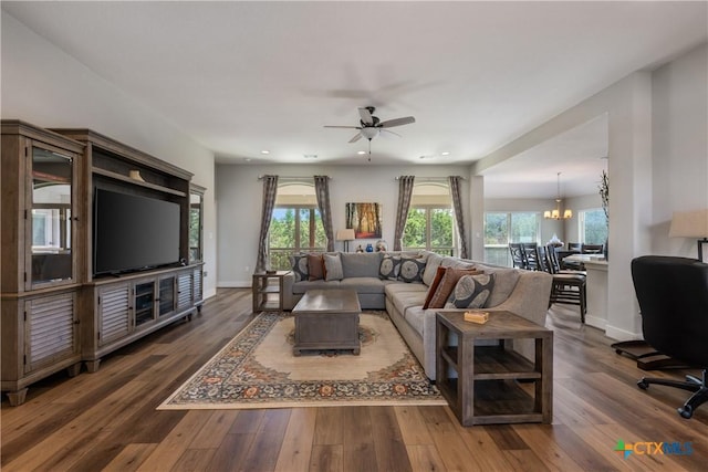 4001 Crockett Ave, Lago Vista, TX 78645 - living area with wood-type flooring, plenty of natural light, a ceiling fan, recessed lighting, and a chandelier