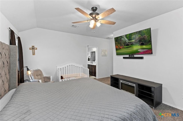 bedroom featuring lofted ceiling, carpet flooring, visible vents, and baseboards