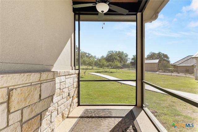 1125 Provence Pl, New Braunfels, TX 78132 - unfurnished sunroom with a ceiling fan