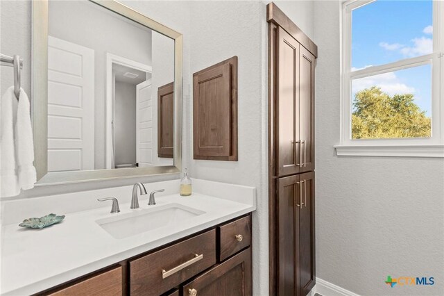 1125 Provence Pl, New Braunfels, TX 78132 - bathroom with vanity and a textured wall