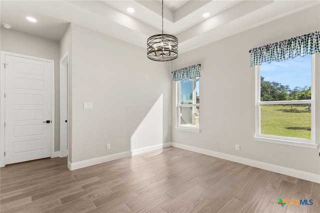 1125 Provence Pl, New Braunfels, TX 78132 - unfurnished room featuring light wood-style flooring, a chandelier, and recessed lighting