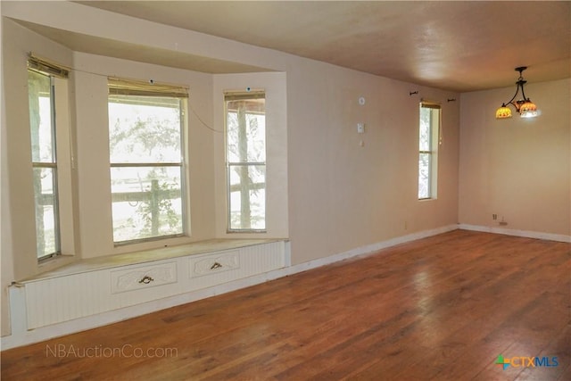 132 Madrona Ln, Bandera, TX 78003 - empty room featuring wood finished floors and baseboards