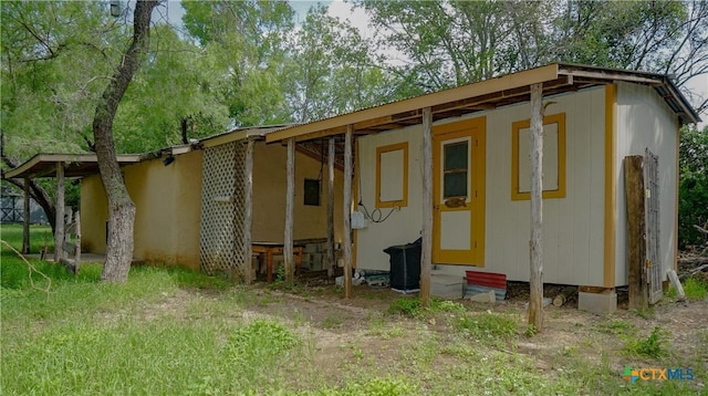 132 Madrona Ln, Bandera, TX 78003 - view of outbuilding featuring entry steps