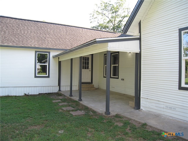 view of property exterior featuring a yard